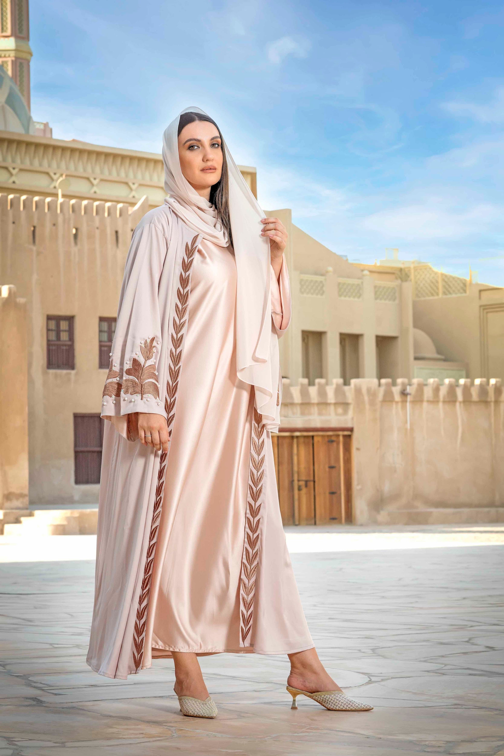 Lady weraring The Yaqeen Abaya – Limited Edition Silk Ensemble
